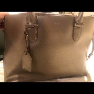 Purse with 2 zipper sections.  Only used once for a wedding.